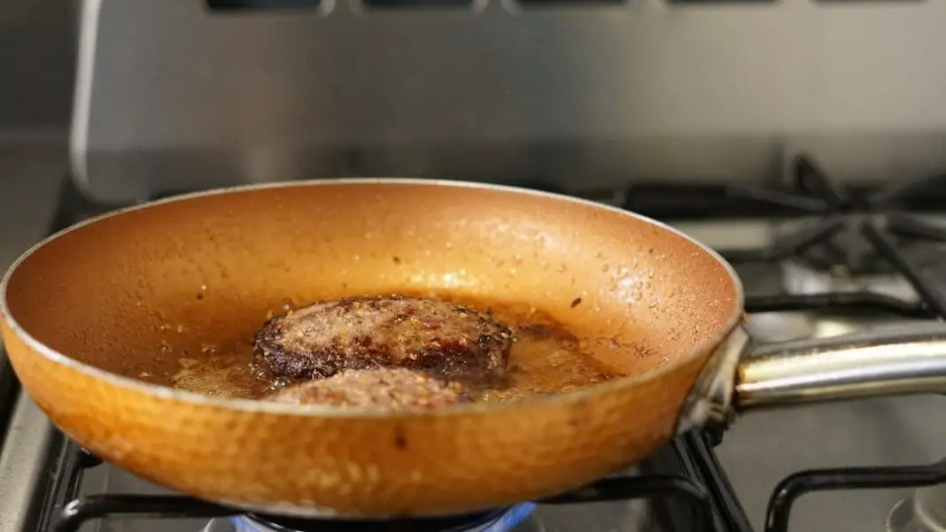 a frying pan filled with food on top of a stove | Photo by Cristian Guillen on Unsplash