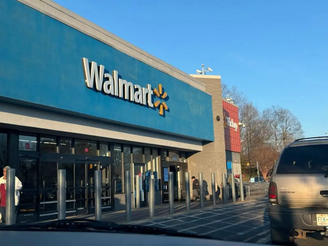 a walmart store with a car parked in front of it