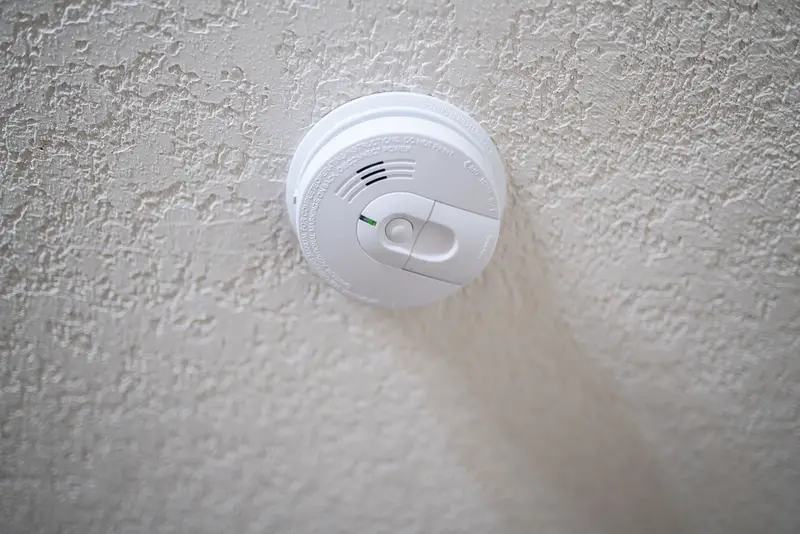 Smoke detector on a house ceiling.